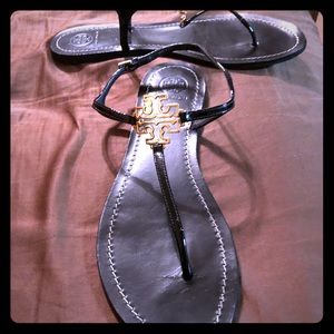 Tory Burch Shoes - Tory Burch Black Sandals with gold emblem! Size 10 Tory Burch Shoes - Tory Burch Black Sandals with gold emblem! Size 10